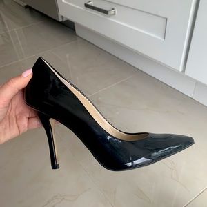 Enzo Angiolini black patent pumps